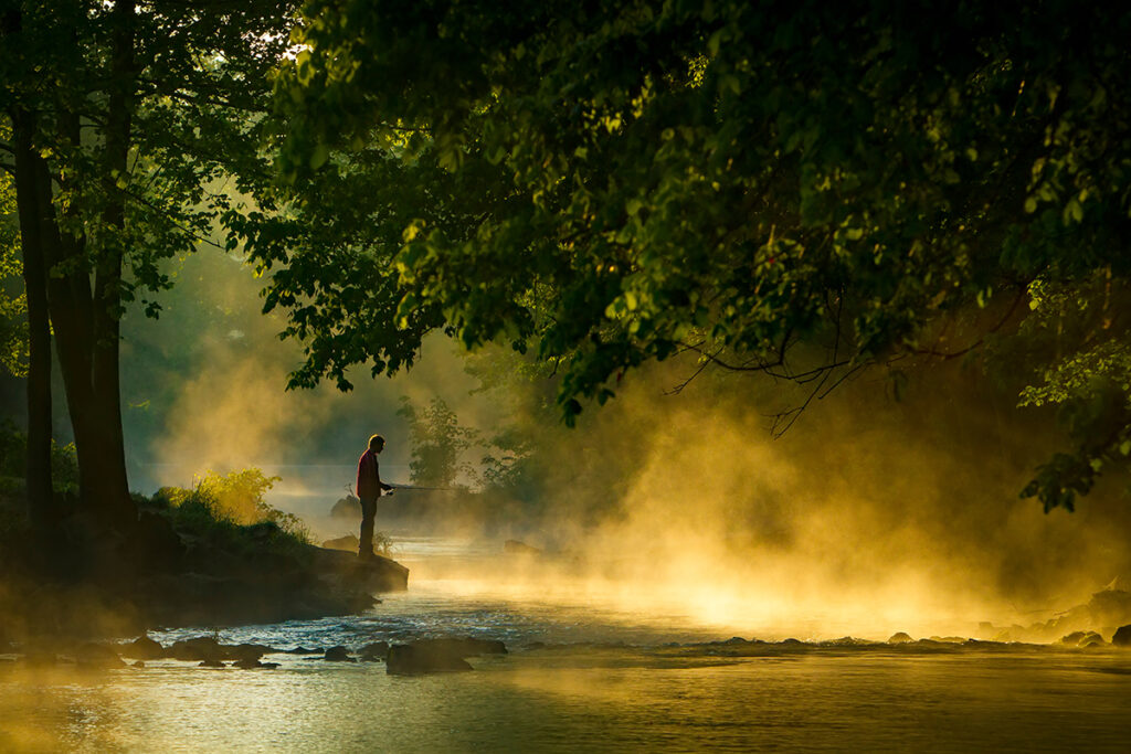Fly fishing for trout at Roaring River State Park in Missouri